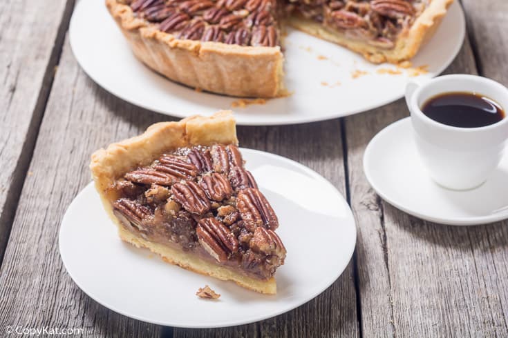 a slice of pecan pie and a cup of coffee