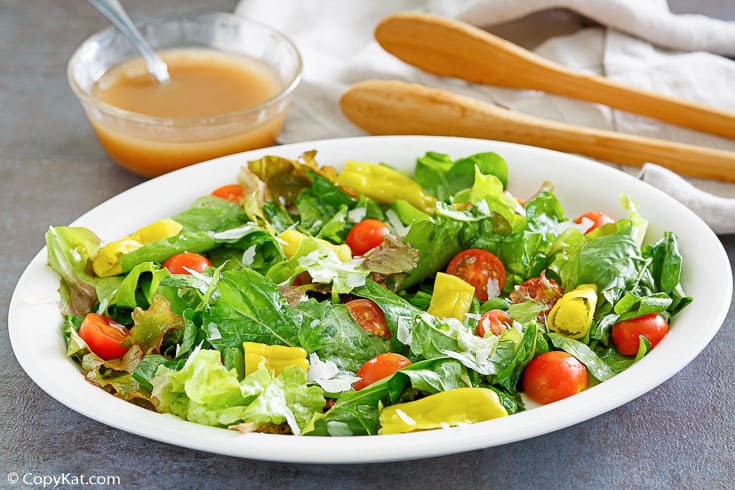 a mixed green salad and homemade Italian salad dressing