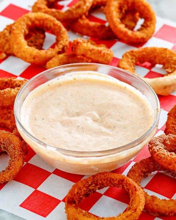 homemade Outback bloomin onion dipping sauce with onion rings