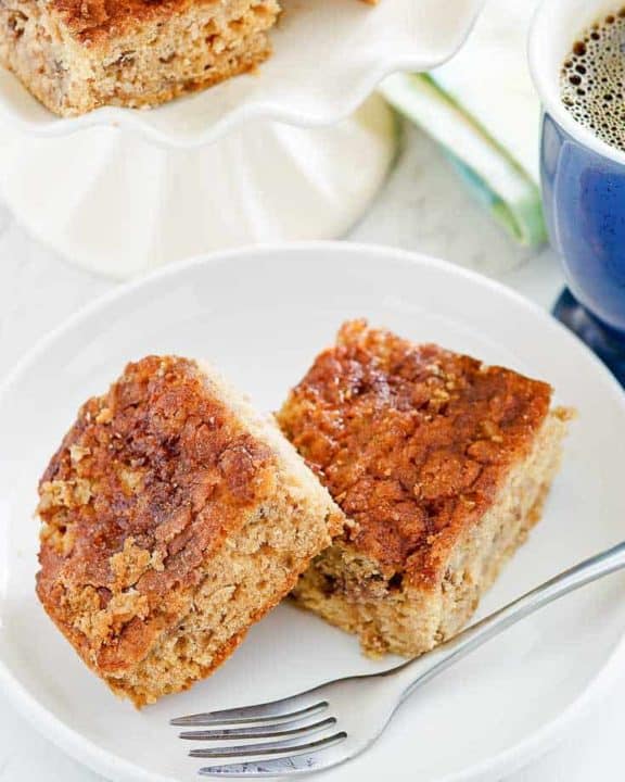 two pieces of rhubarb coffee cake on a plate