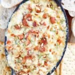 bacon Swiss dip with almonds and crackers
