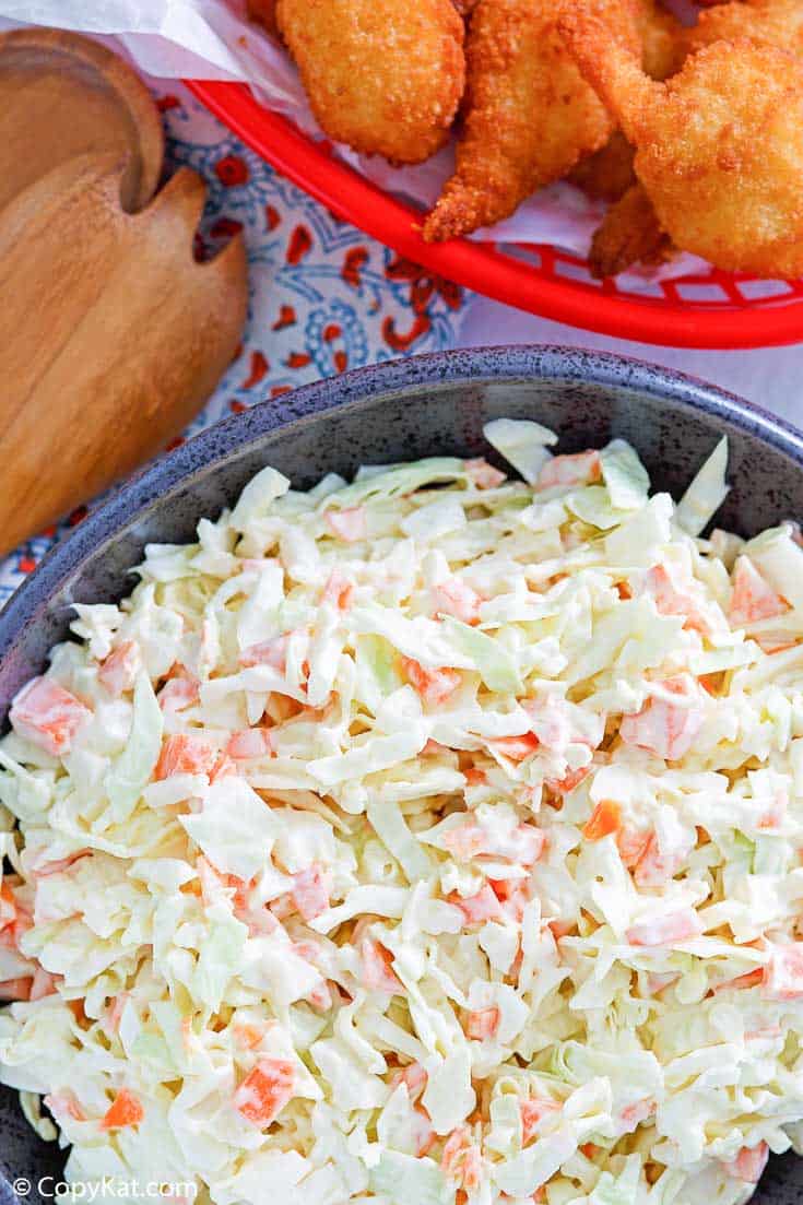 a bowl of homemade Captain D's cole slaw and hush puppies