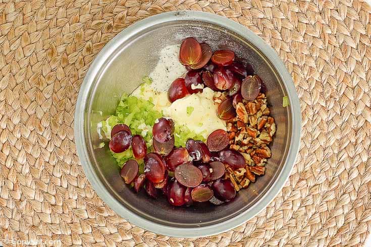 grapes, pecans, celery, mayonnaise, and dry ranch dressing in a mixing bowl