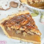 a slice of pecan pie on a plate