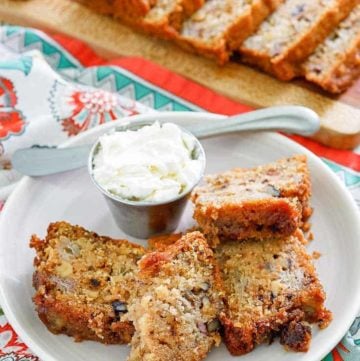 slices of rhubarb bread on a plate and cutting board