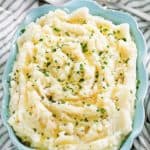 old fashioned mashed potatoes in a blue serving dish