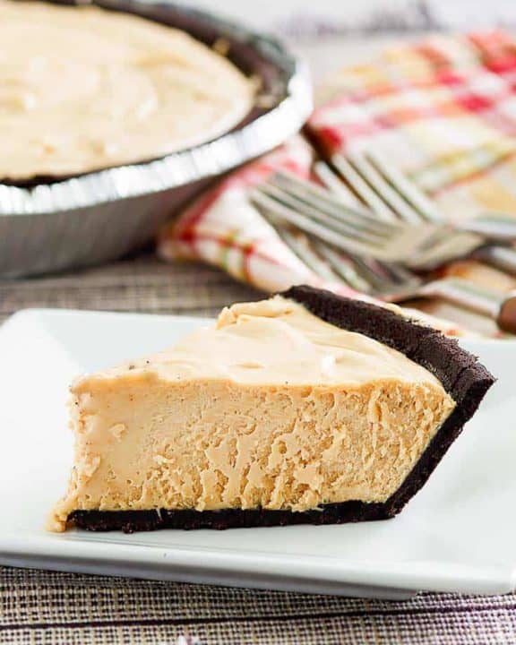a slice of peanut butter pie with chocolate cookie crust