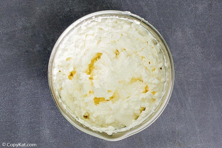 whipped cream in a mixing bowl