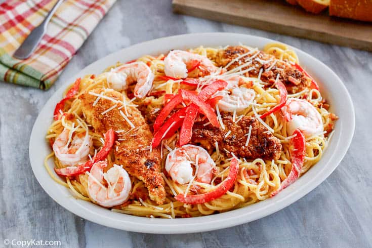 Homemade Olive Garden Chicken and Shrimp Carbonara on a white plate