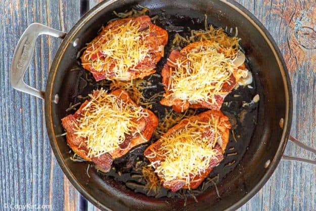 Alice Springs Chicken in a skillet before melting cheese on top