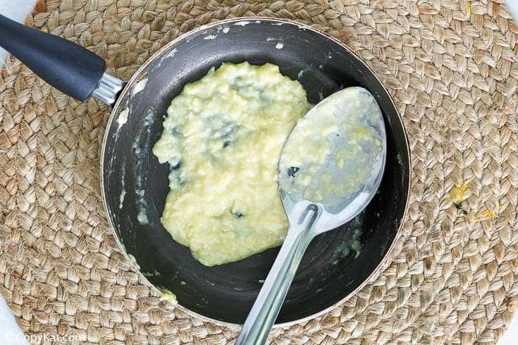 egg, garlic, and olive oil mixture in a skillet