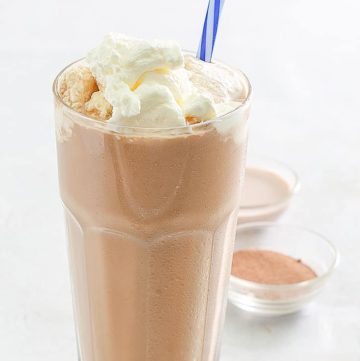 iced mocha with whipped cream in a tall glass