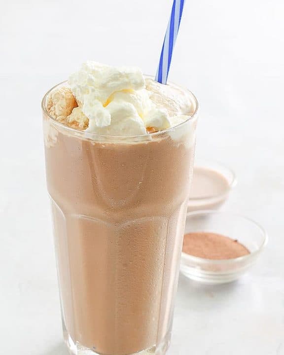 iced mocha with whipped cream in a tall glass
