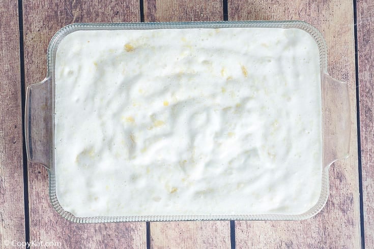 pineapple angel food cake batter in a baking dish