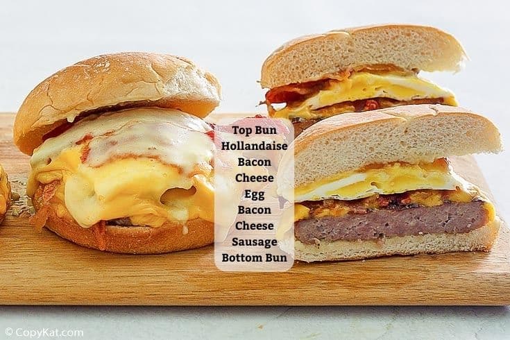 two homemade Wendy's Breakfast Baconator sandwiches with list of ingredients