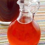homemade caramel syrup for coffee in a small carafe