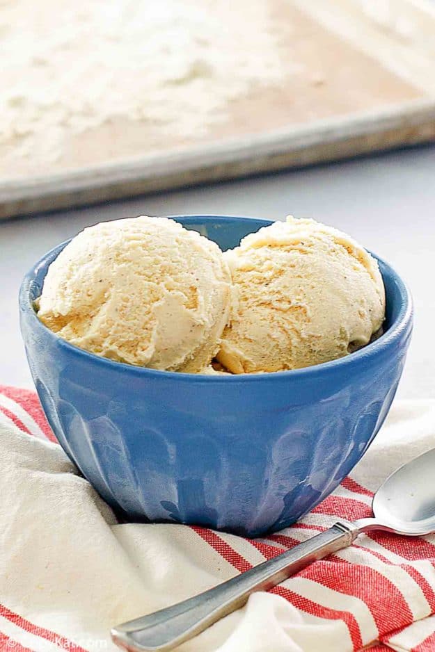 scoops of homemade cake batter ice cream in a blue bowl