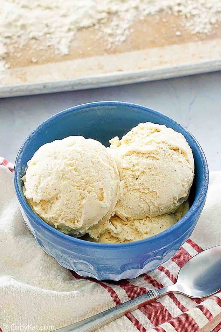 the scoops of cake batter ice cream in a blue bowl