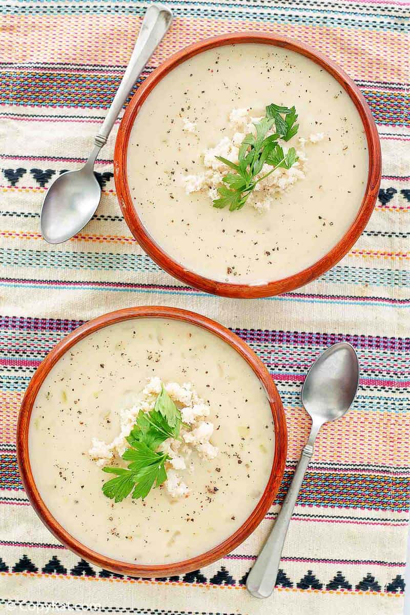 overhead view of two bowls of crab bisque