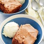 bowls of homemade double chocolate fudge coca cola cake with ice cream