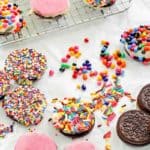 white chocolate covered oreos topped with sprinkles