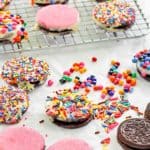 white chocolate covered Oreos decorated with spinkles