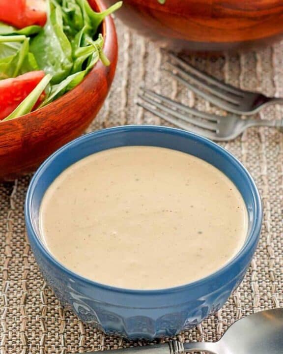 a bowl of homemade Russian salad dressing and salad