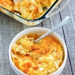 cheesy hashbrown casserole in a bowl and baking dish