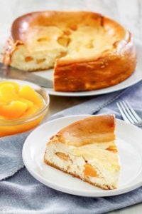 homemade Olive Garden Peach Cheesecake slice on a plate