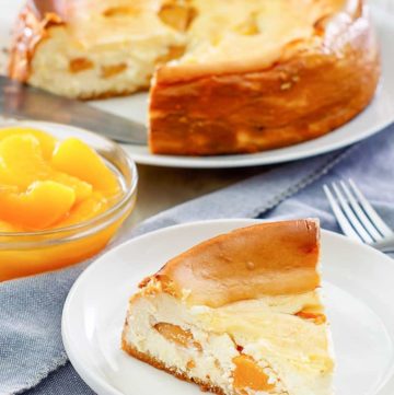homemade Olive Garden Peach Cheesecake slice on a plate