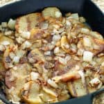 pan fried potatoes and onions in a skillet