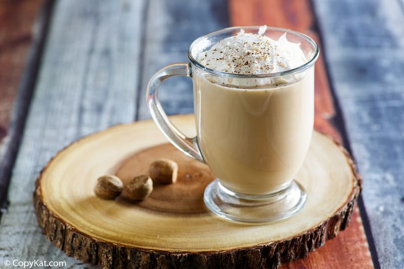 eggnog latte topped with whipped cream and nutmeg