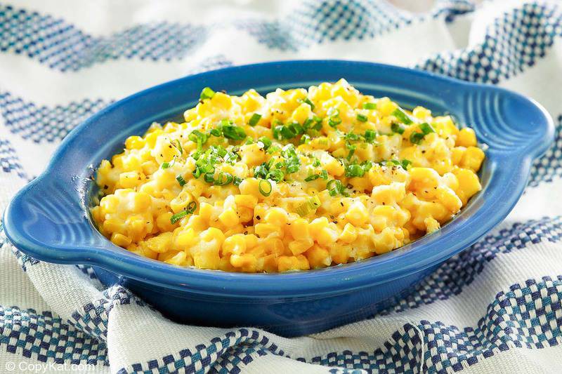 homemade Brookville Hotel creamed corn in a blue serving dish