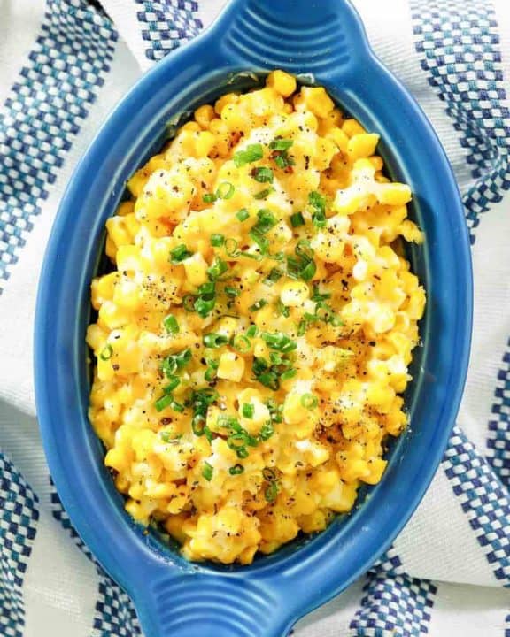 homemade Brookville Hotel creamed corn in a blue serving dish