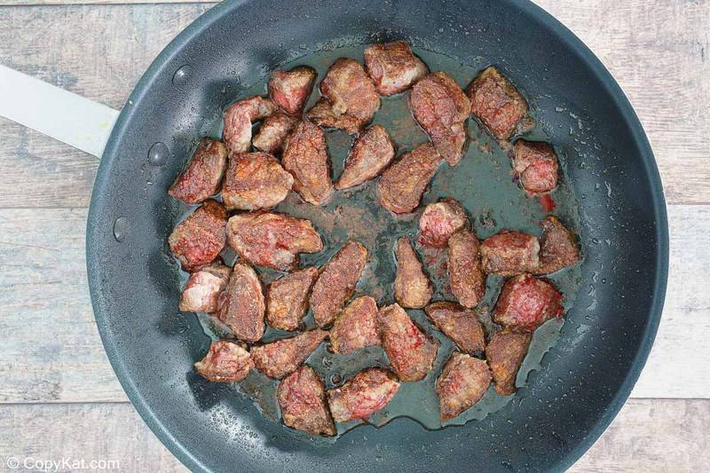 browned beef tips in a skillet