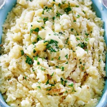 homemade Cracker Barrel mashed potatoes in a blue serving dish