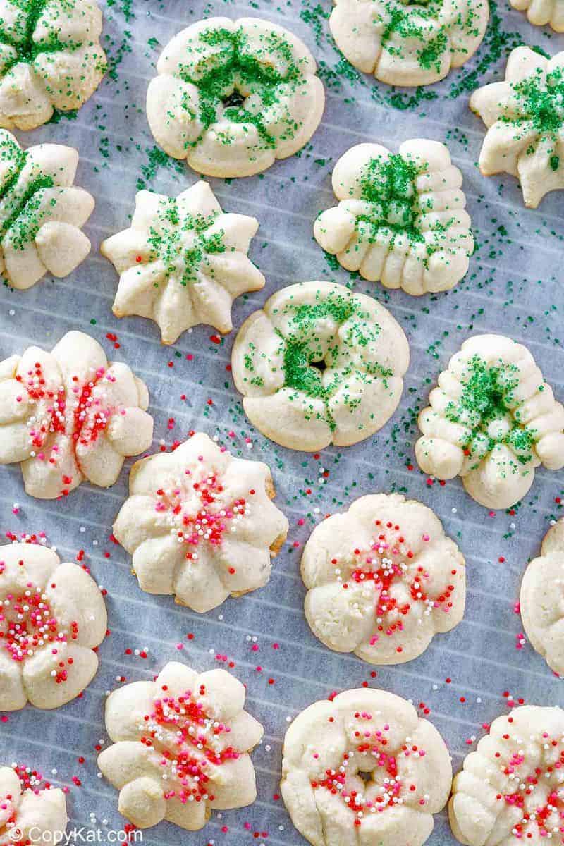 cream cheese spritz cookies on parchment paper