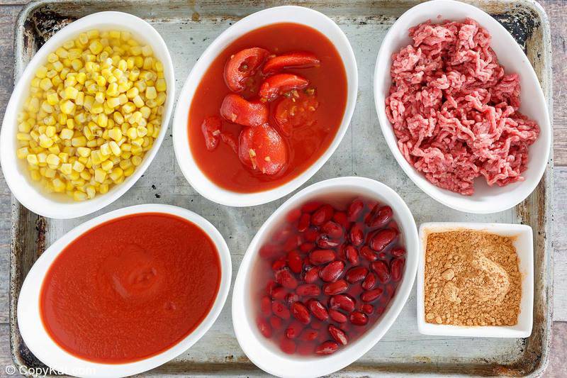 easy taco soup ingredients in bowls on a baking sheet