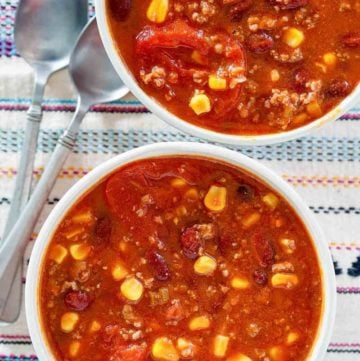 overhead view of two bowls of taco soup