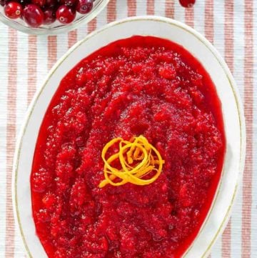 overhead view of a bowl of homemade Luby's cranberry relish and fresh cranberries