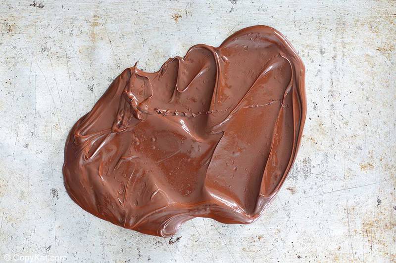 melted chocolate on a baking sheet
