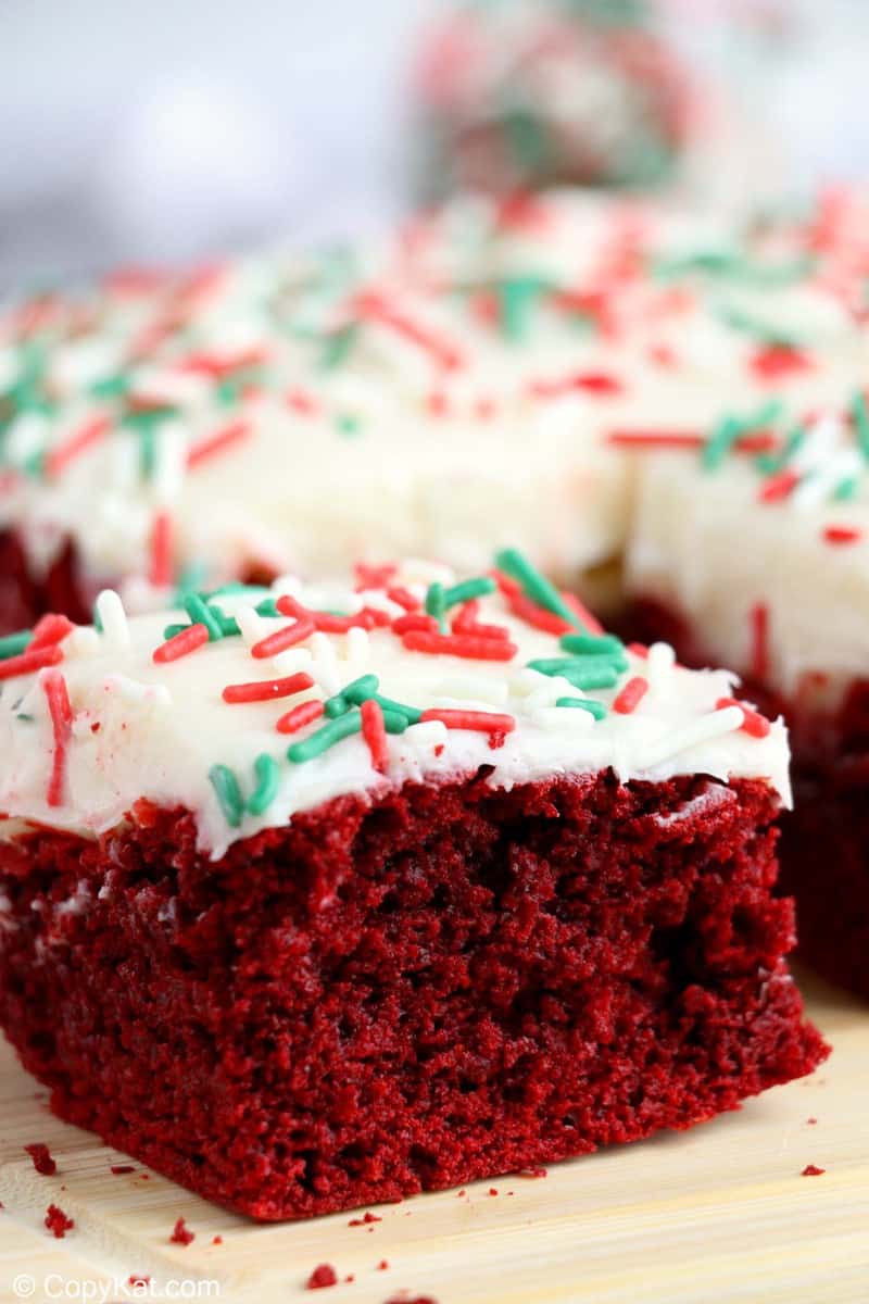 red velvet brownies with cream cheese frosting and sprinkles
