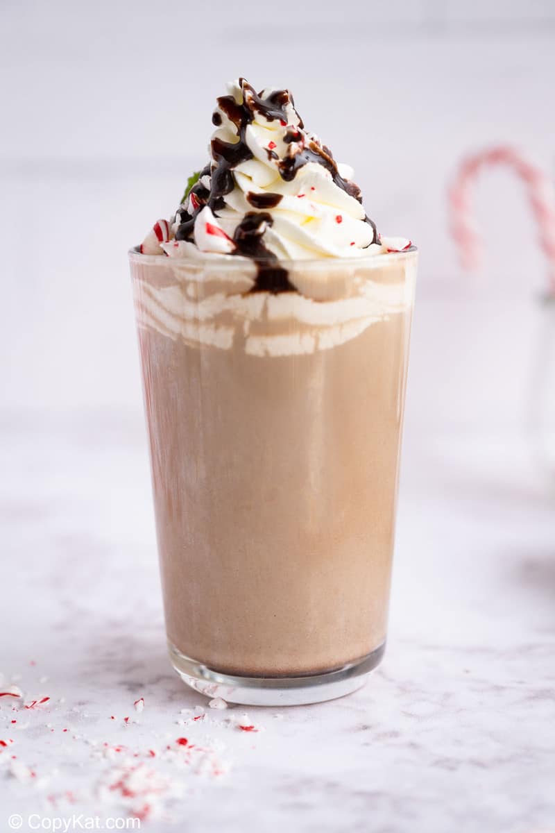 homemade Starbucks Peppermint Mocha with whipped cream, chocolate syrup, and peppermint candy