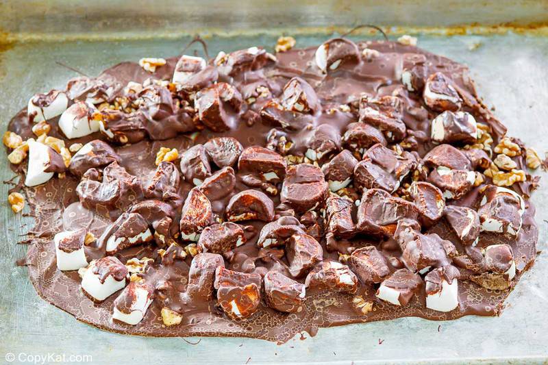 cooled walnut rocky road candy on a baking sheet