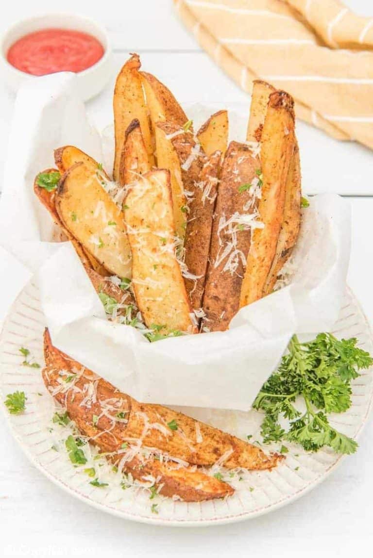 air fried potato wedges sprinkled with parmesan cheese and parsley
