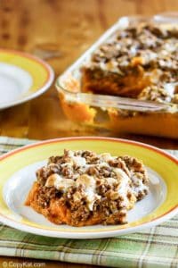 homemade Boston Market sweet potato casserole on a plate and in a baking dish