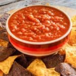 a bowl of homemade Chili's salsa and tortilla chips
