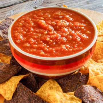 a bowl of homemade Chili's salsa and tortilla chips
