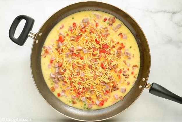 Colorado omelette cooking in a skillet