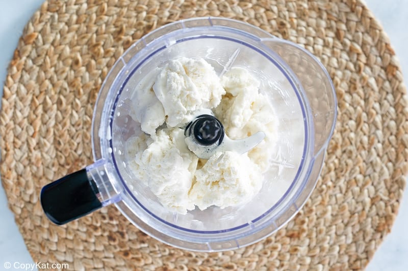 vanilla ice cream and milk in a blender